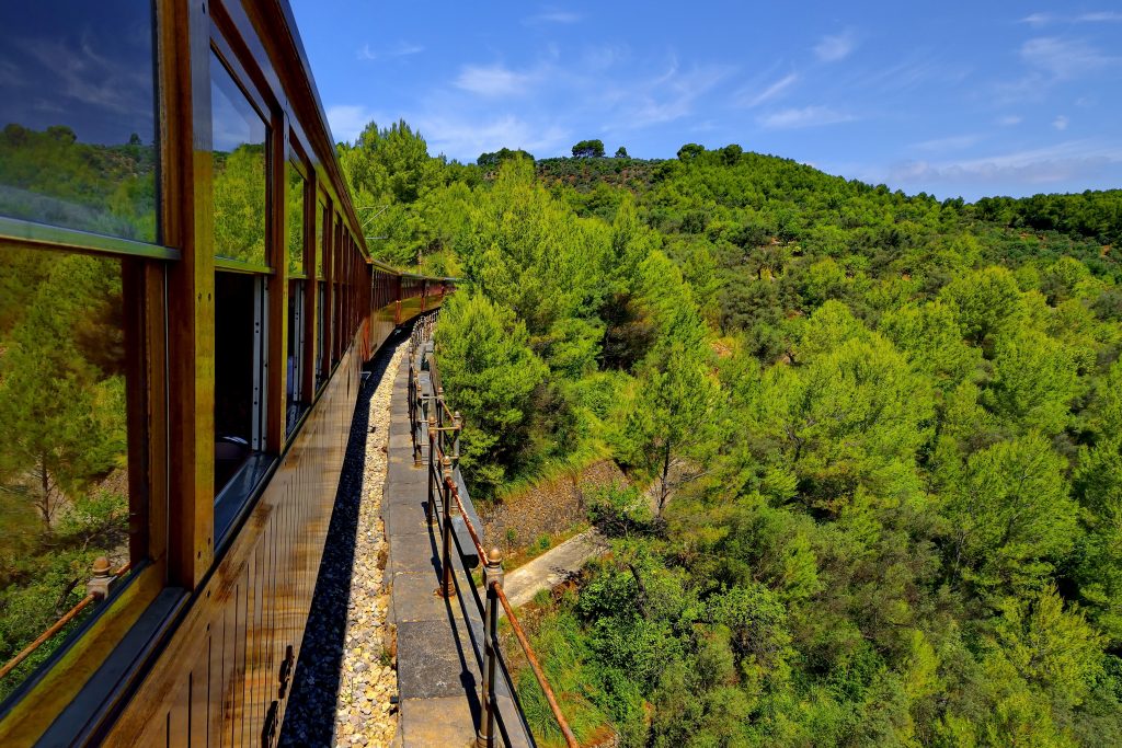 Palma to Soller train moving through the Mallorca countryside